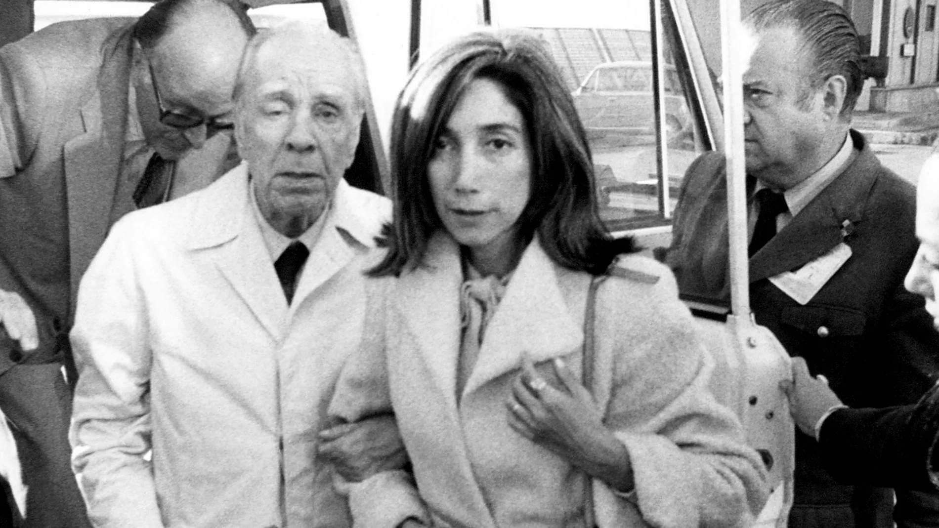 Argentine writer Jorge Luis Borges, accompanied by his secretary Maria Kodama, arrives in Madrid, Spain to receive the Spanish literary prize "Miguel de Cervantes."