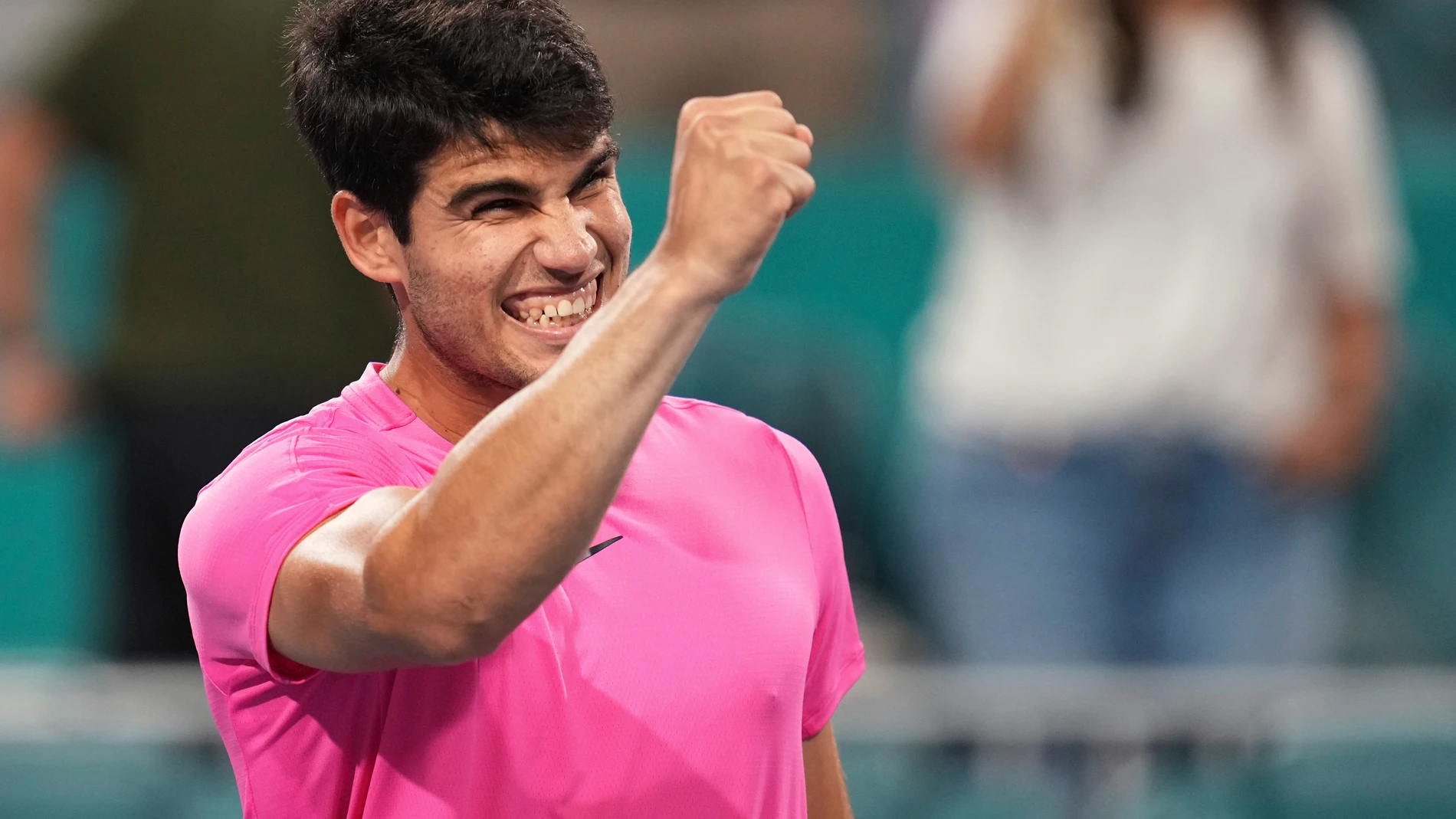 Carlos Alcaraz, of Spain, clenches his fist after defeating Taylor Fritz, of the United States, at the Miami Open tennis tournament Thursday, March 30, 2023, in Miami Gardens, Fla. (AP Photo/Jim Rassol)