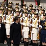 French President Emmanuel Macron, second from left, inspects an honor guard with Chinese President Xi Jinping outside the Great Hall of the People in Beijing, Thursday, April 6, 2023
