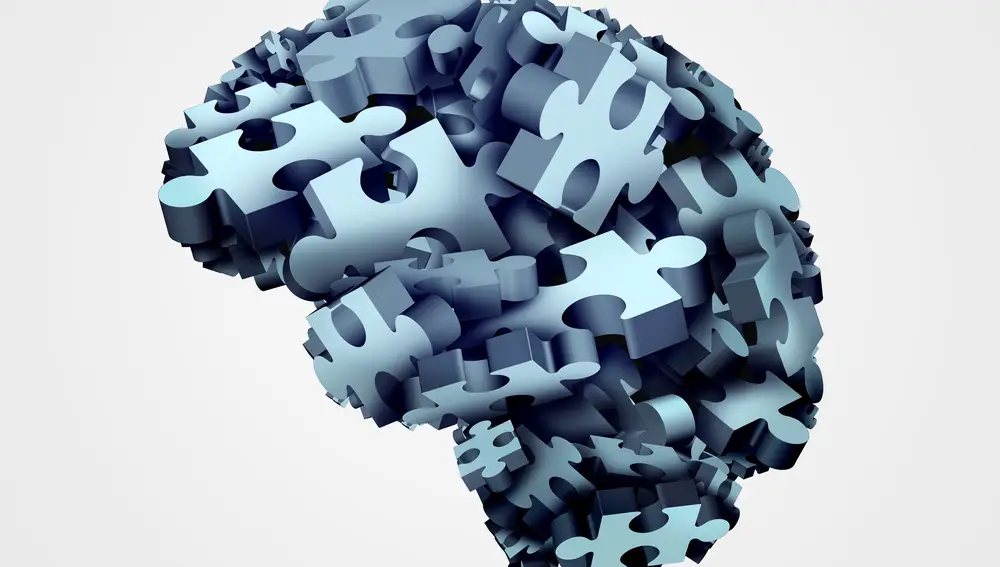 Ilustración que representa un cerebro compuesto por fichas de puzzle
