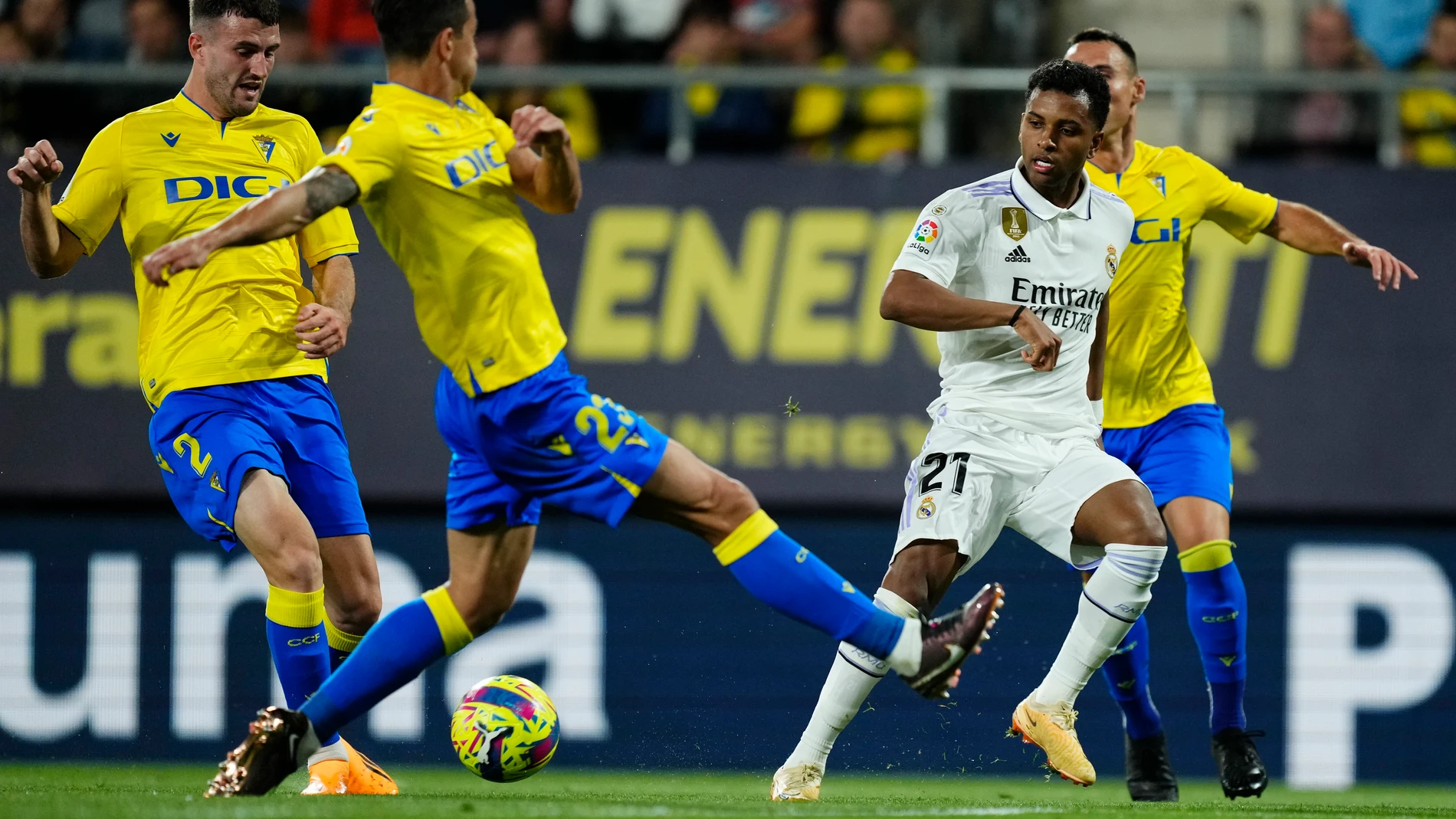 Real Madrid's Rodrygo, second from right, challenges for the ball with Cadiz's Raul Parra, left, Luis Hernandez, second from left, and Sergi Guardiola during the Spanish La Liga soccer match between Cadiz CF and Real Madrid at the Nuevo Mirandilla stadium in Cadiz, Spain, Saturday, April 15, 2023. (AP Photo/Jose Breton)