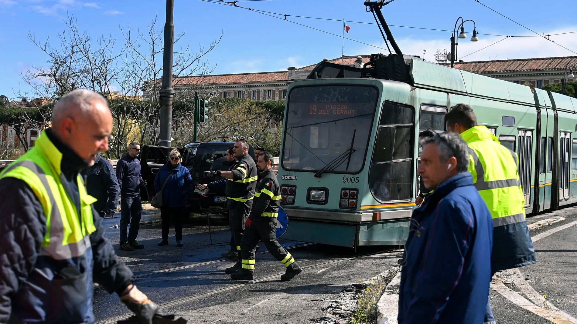 Rome (Italy), 16/04/2023.- Police and Fire Department officers inspect the site of an accident between the car of SS Lazio captain Ciro Immobile (not pictured) and a tram on the Giacomo Matteotti Bridge in Rome, Italy, 16 April 2023. The accident involved eight people including Immobile, his two daughters, and tram passengers who were taken to hospital for examination. The player, 'a little sore in the arm', spoke to police claiming the tram had run a red light. (Incendio, Italia, Roma) EFE/EPA/RICCARDO ANTIMIANI