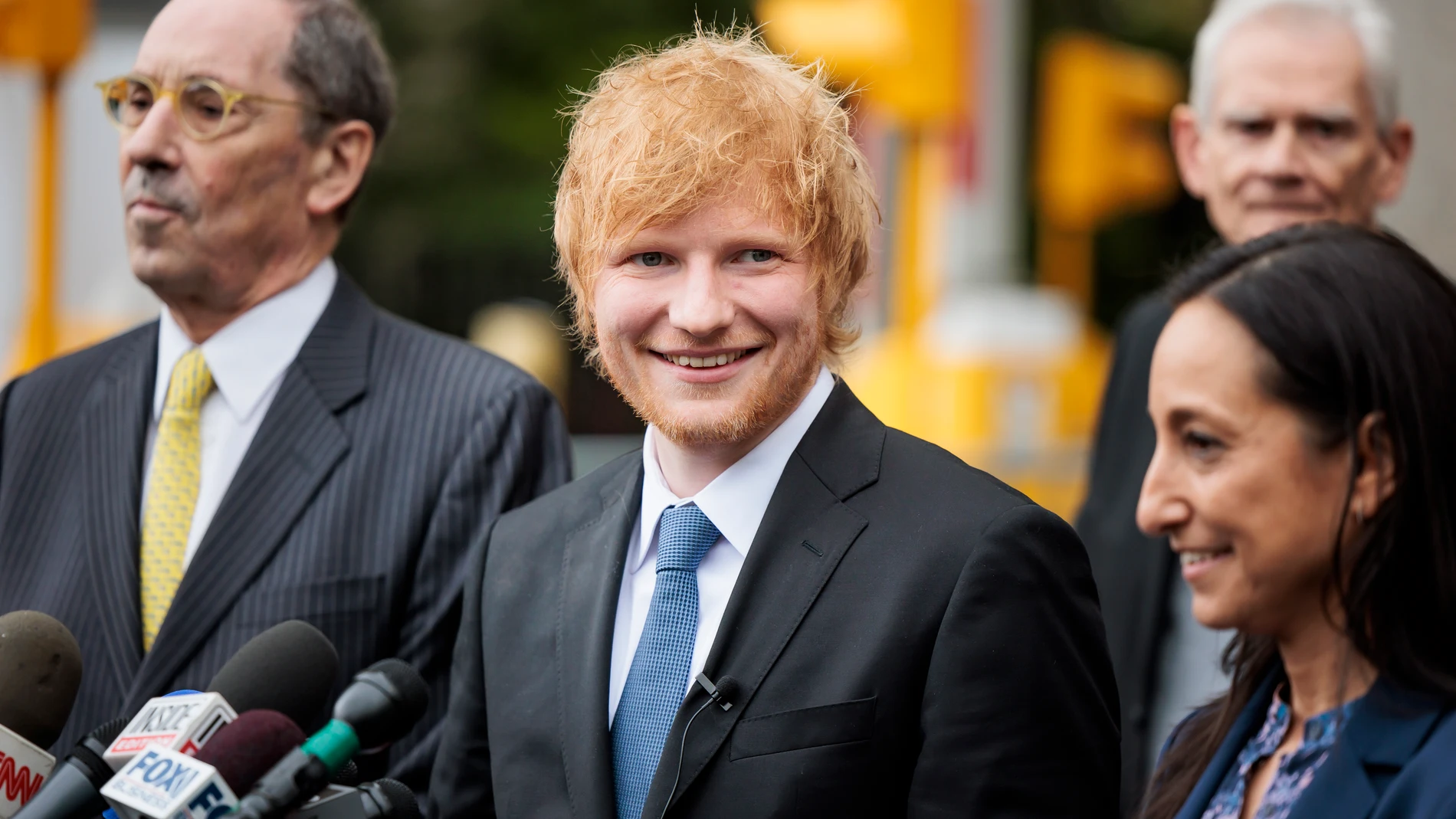 New York (United States), 04/05/2023.- Musician Ed Sheeran (C) smiles while standing with his legal team after winning his copyright infringement case in New York, New York, USA, 04 May 2023. Sheeran had been accused of copying portions of the Marvin Gaye song 'Let'Äôs Get it On', which was co-written by Ed Townsend, in his song 'Thinking Out Loud'. (Estados Unidos, Nueva York) EFE/EPA/JUSTIN LANE