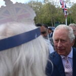 King Charles III and the Prince and Princess of Wales talk to well wishers