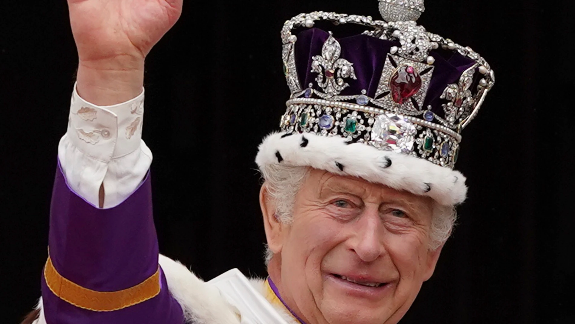 King Charles III waves as he leaves the balcony of Buckingham Palace, London, following his coronation Saturday May 6, 2023. (Stefan Rousseau/Pool photo via AP)