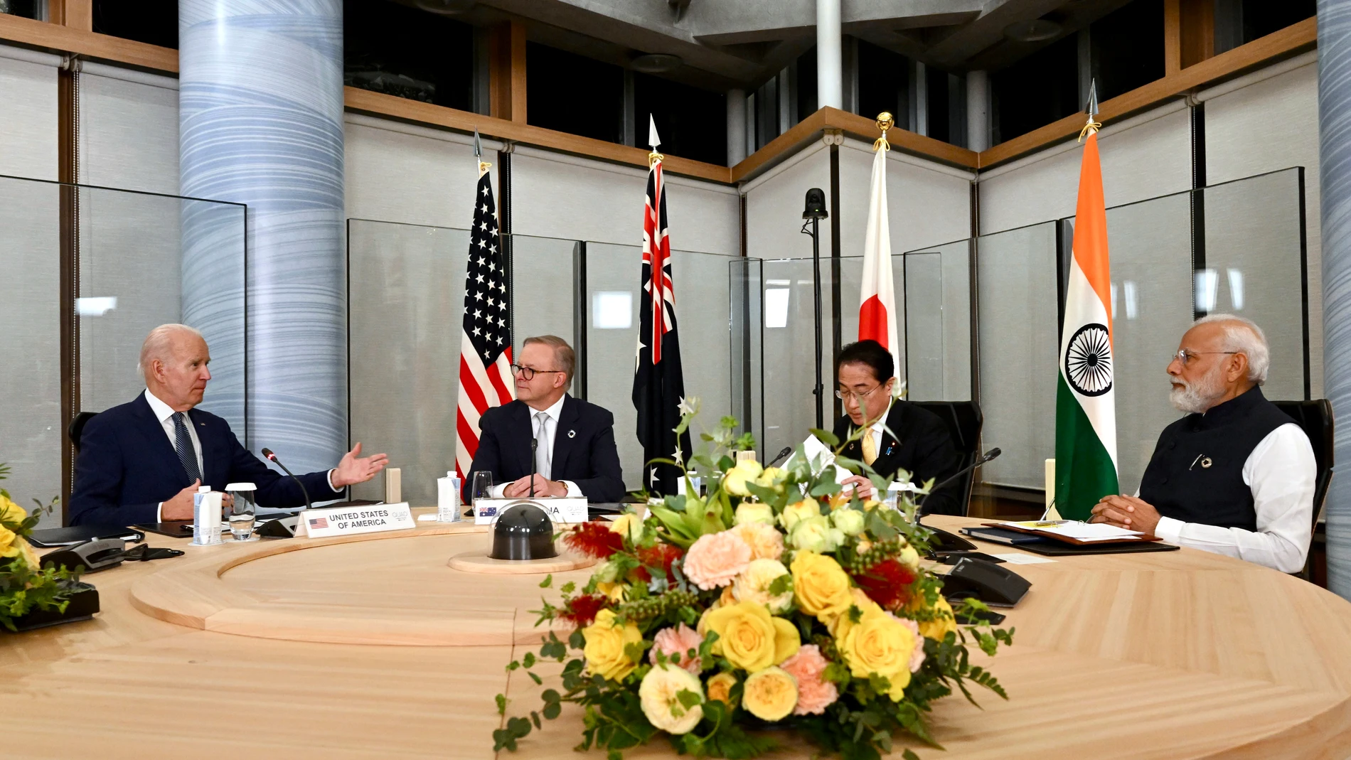 U.S. President Joe Biden, left, Australian Prime Minister Anthony Albanese, second left, Japanese Prime Minister Fumio Kishida, third left, and Indian Prime Minister Narendra Modi attend a Quad Leaders' meeting, on the sidelines of the G7 summit in Hiroshima, western Japan, Saturday, May 20, 2023. (Kenny Holston/Pool Photo via AP)