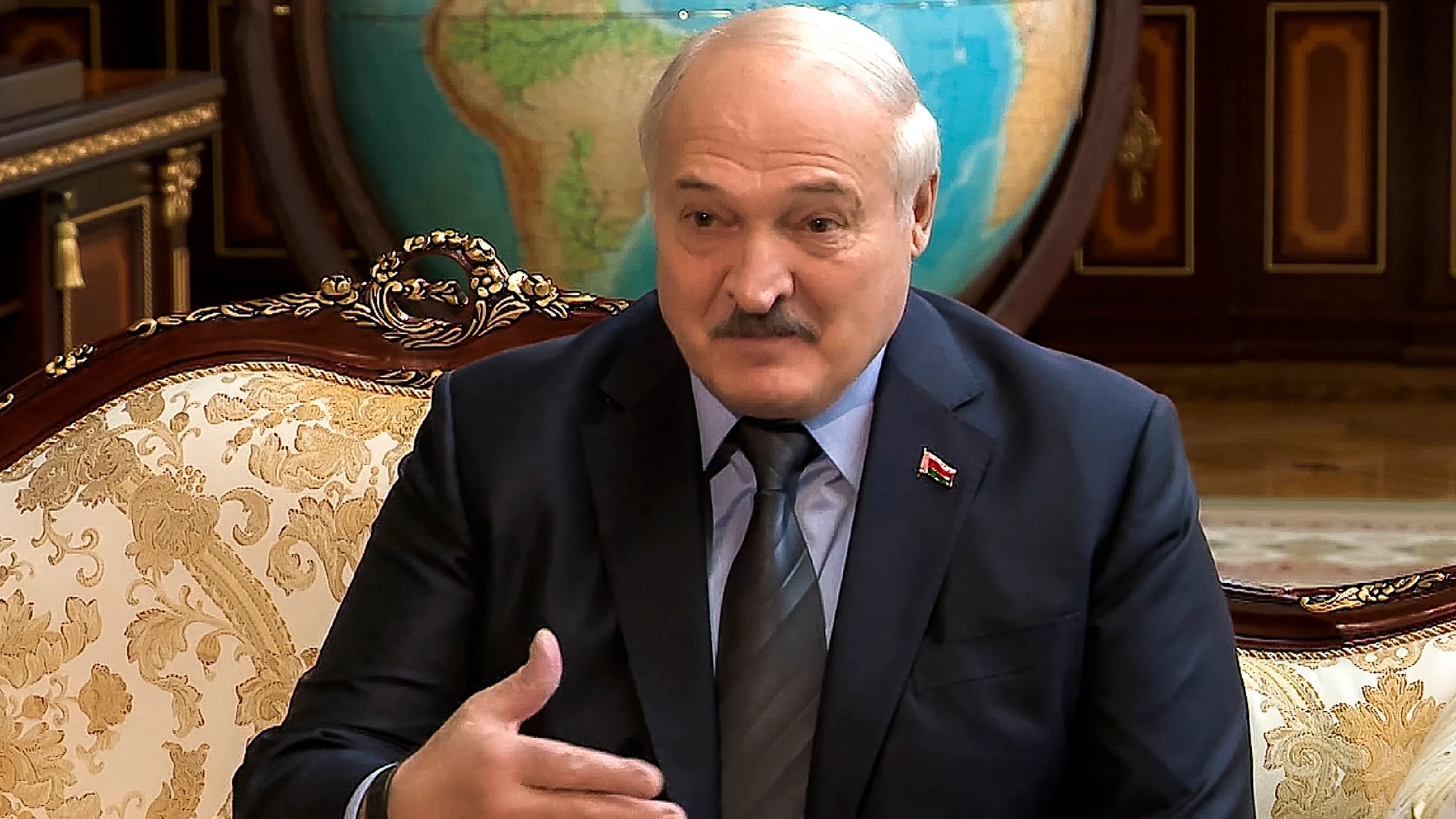 This handout photo taken from video released Monday, May 29, 2023 by Belarus' Presidential Press Office, shows Belarusian President Alexander Lukashenko gesturing while speaking to the head of Russia's Central Bank Elvira Nabiullina, in Minsk, Belarus. (Belarus' Presidential Press Office via AP)