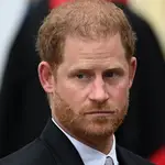 Britain's Prince Harry, the Duke of Sussex, departs after the Coronation of Britain's King Charles III and Queen Camilla at Westminster Abbey.