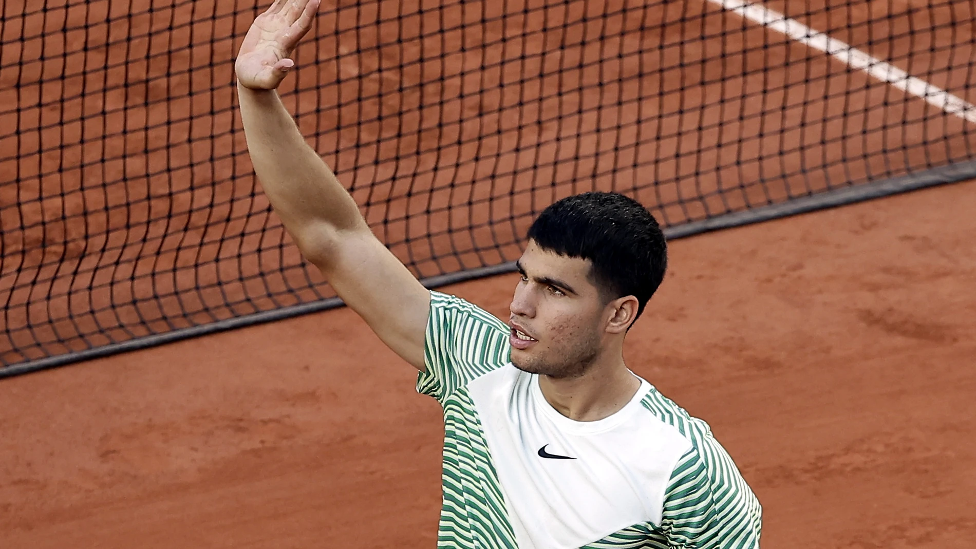 Paris (France), 29/05/2023.- Carlos Alcaraz of Spain reacts after winning against Flavio Cobolli of Italy in their Men's Singles first round match during the French Open Grand Slam tennis tournament at Roland Garros in Paris, France, 29 May 2023. (Tenis, Abierto, Francia, Italia, España) EFE/EPA/CHRISTOPHE PETIT TESSON 