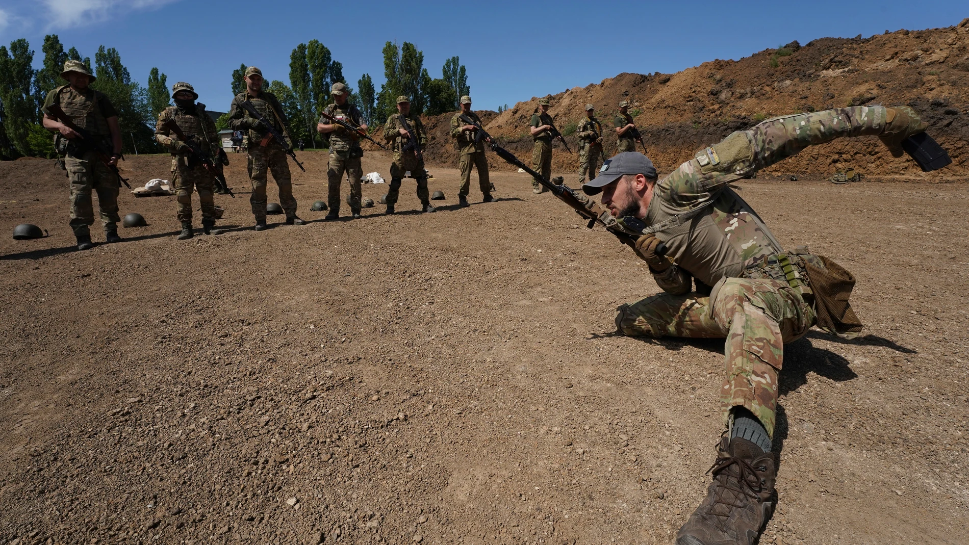 Servicemen of the newly created National Guard unit train in the Kharkiv region, Ukraine, Thursday, June 1, 2023. (AP Photo/Andrii Marienko)