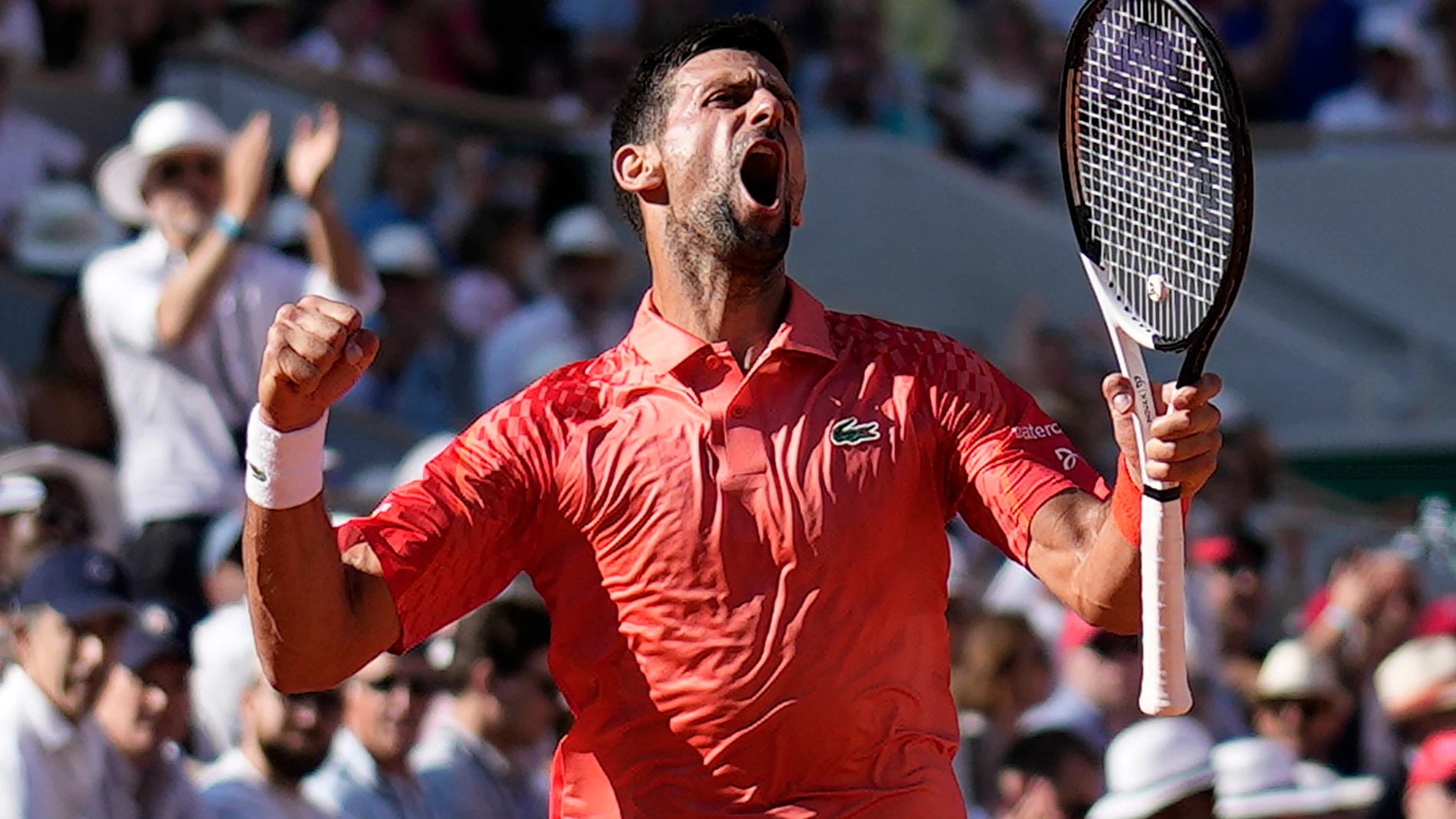 Serbia's Novak Djokovic clenches his fist after scoring a point against Spain's Alejandro Davidovich Fokina during their third round match of the French Open tennis tournament at the Roland Garros stadium in Paris, Friday, June 2, 2023. (AP Photo/Christophe Ena)