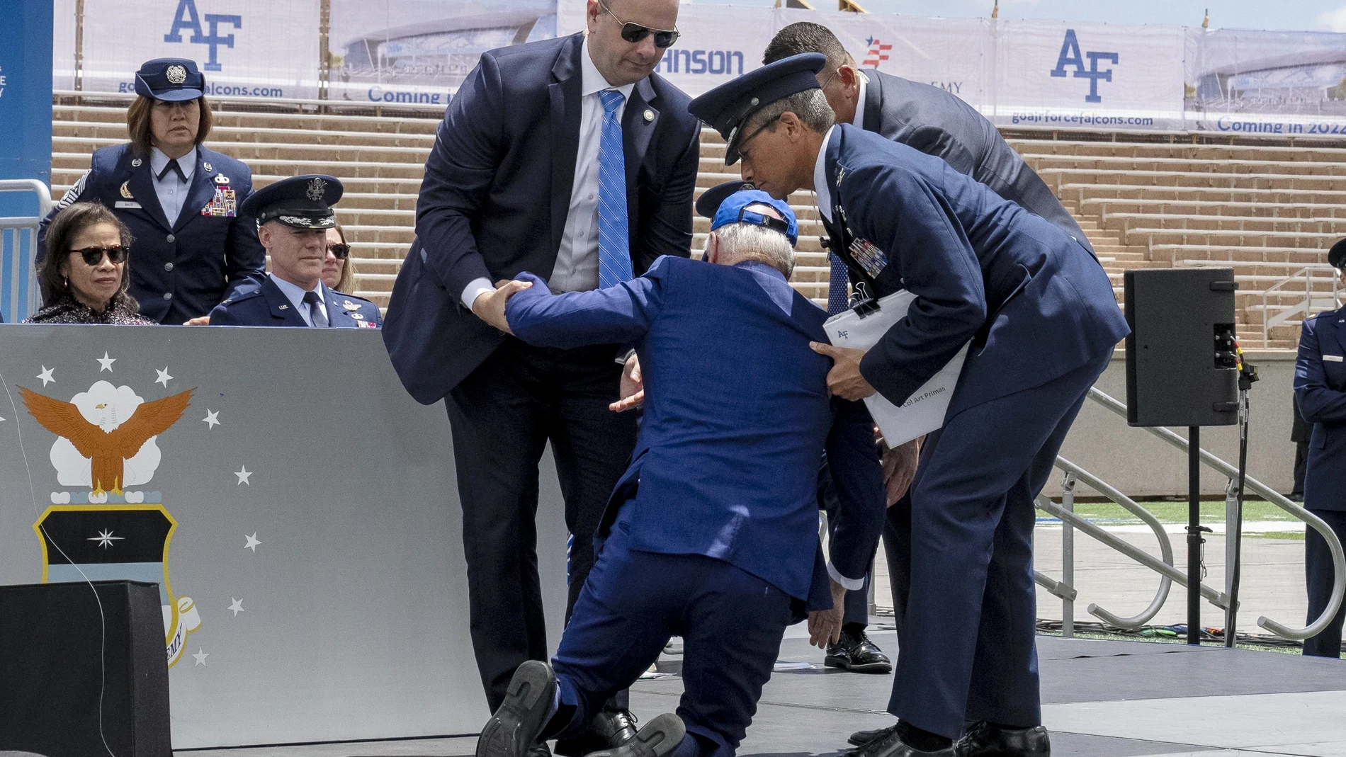 President Joe Biden falls on stage during the 2023 United States Air Force Academy Graduation Ceremony at Falcon Stadium, Thursday, June 1, 2023, at the United States Air Force Academy in Colorado Springs,