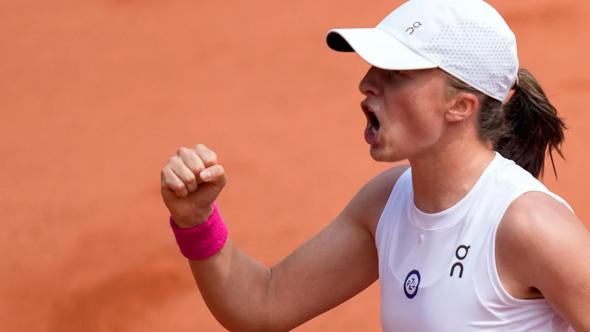 Poland's Iga Swiatek reacts during her final match of the French Open tennis tournament against Karolina Muchova of the Czech Republic at the Roland Garros stadium in Paris, Saturday, June 10, 2023. (AP Photo/Thibault Camus)