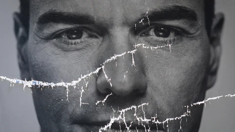 A partially damaged poster of Spanish Prime Minister and Socialist Party candidate Pedro Sanchez flaps in Parla, outskirts Madrid, Spain.