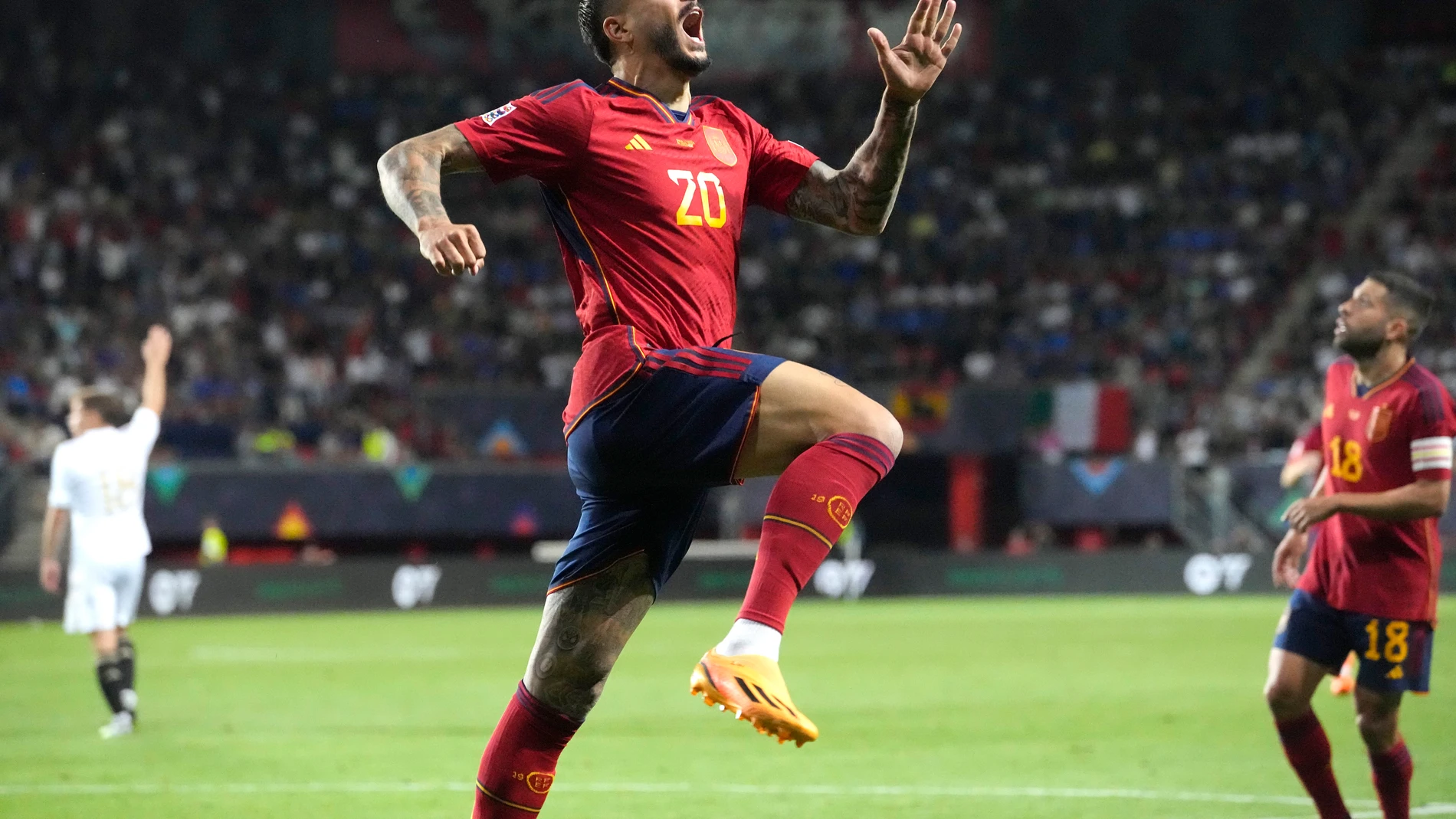 Spain's Joselu celebrates after scoring his side's second goal during the Nations League semifinal soccer match between the Spain and Italy at De Grolsch Veste stadium in Enschede, eastern Netherlands, Thursday, June 15, 2023. (AP Photo/Martin Meissner)