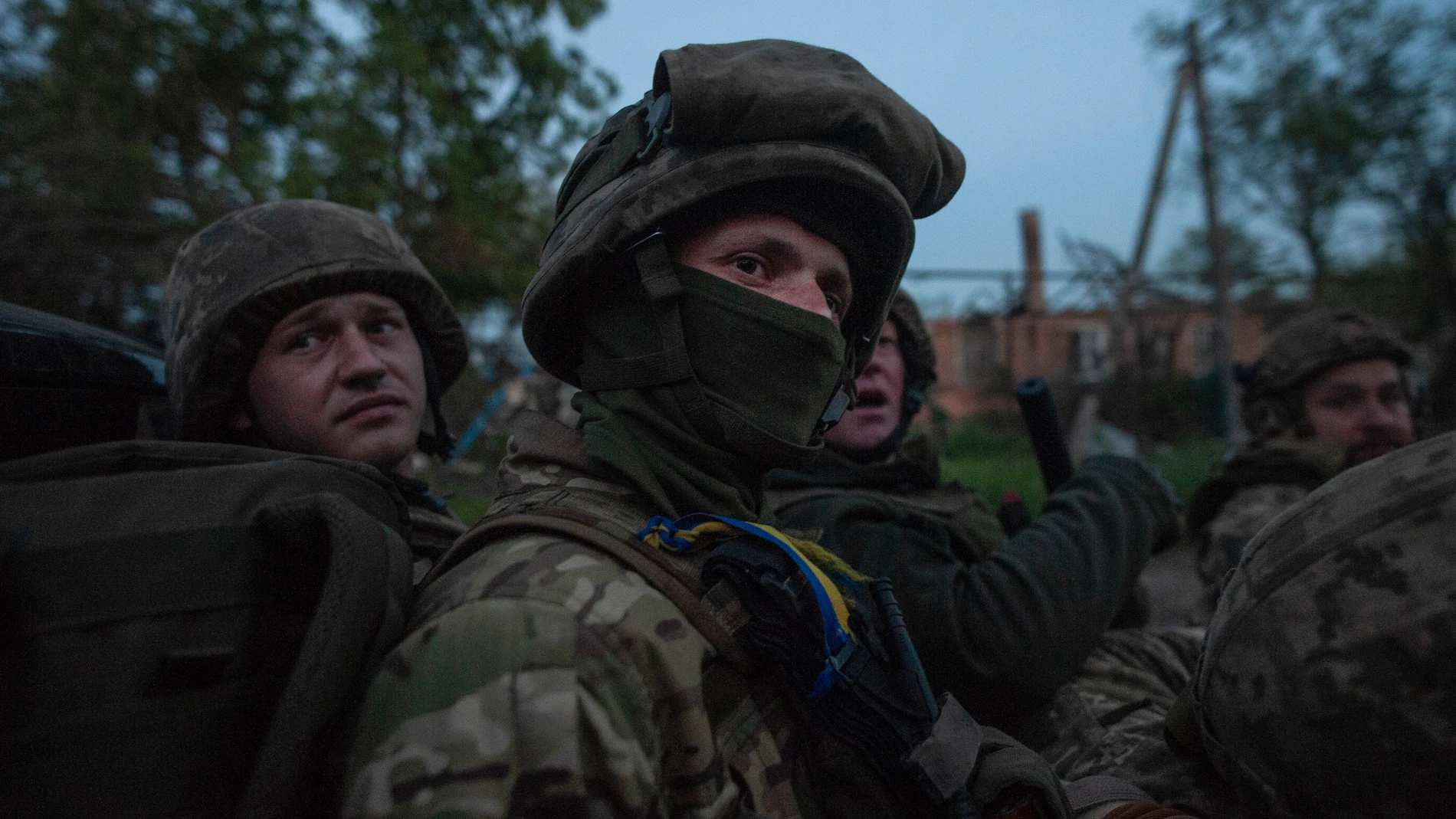 Ukrainian soldiers sit in a pickup truck at their position on the frontline close to Bakhmut, Donetsk region, Ukraine, Friday, June 16, 2023. (Iryna Rybakova via AP)