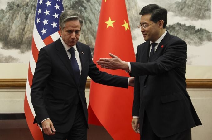 US Secretary of State Antony Blinken (L) and China's Foreign Minister Qin Gang greet each other ahead of a meeting at the Diaoyutai State Guesthouse in Beijing on June 18, 2023. 