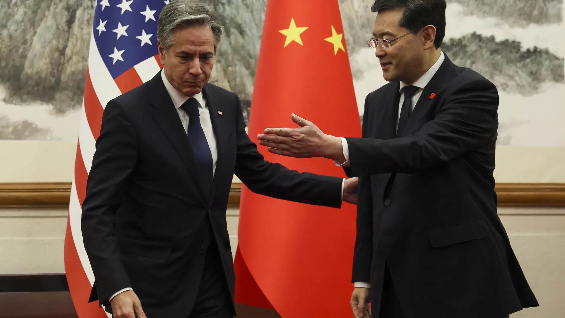 US Secretary of State Antony Blinken (L) and China's Foreign Minister Qin Gang greet each other ahead of a meeting at the Diaoyutai State Guesthouse in Beijing on June 18, 2023. 