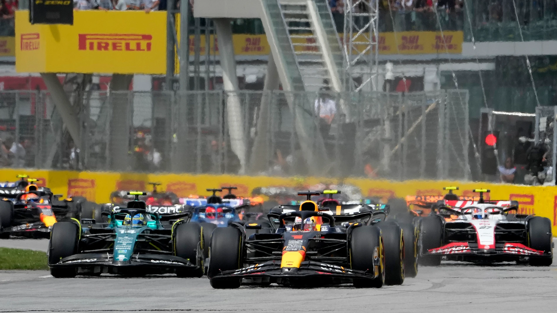 Red Bull Racing Max Verstappen, of the Netherlands, leads the pack during the Formula One Canadian Grand Prix auto race Sunday, July 18, 2023, in Montreal. (Ryan Remiorz/The Canadian Press via AP)