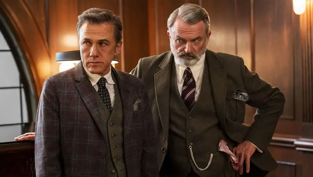 Christoph Waltz y Sam Neill dan vida los peculiares directivos de la empresa