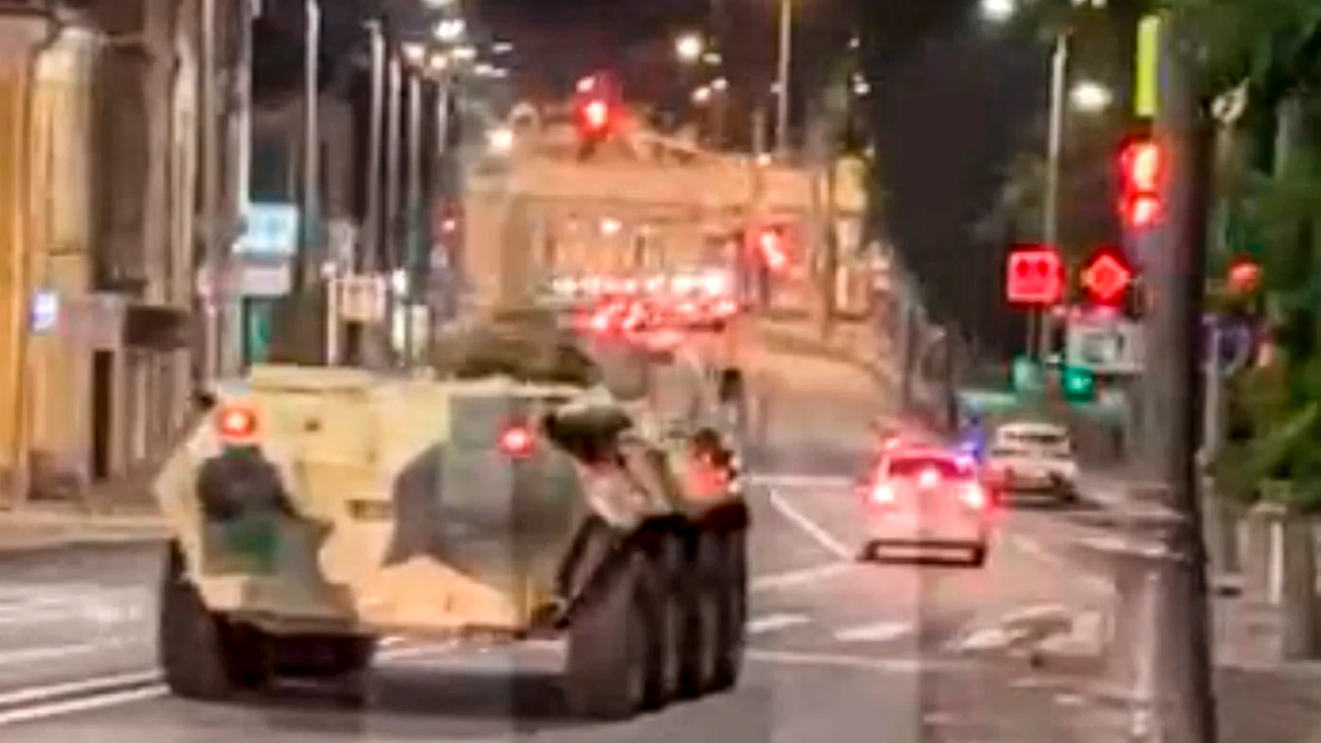 This screen grab from video provided by Ostorozhno Novosti, Saturday, June 24, 2023, reportedly shows a military vehicle driving through a street in Moscow. (Ostorozhno Novosti via AP)