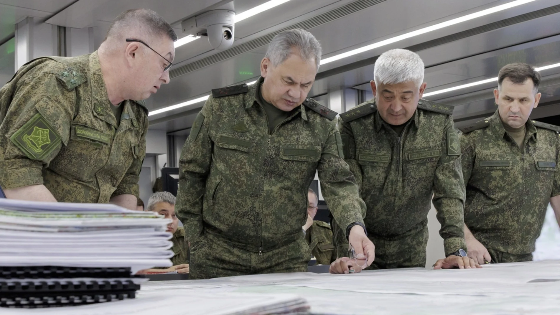 A handout image provided by the Russian Defence Ministry's press service shows Russian Minister of Defence Sergei Shoigu (C) inspecting the forward command post of the 'ÄòWestern'Äô group of troops in the zone of the special operation in Ukraine at an undisclosed location, 26 June 2023.