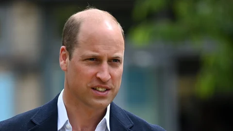 William, Prince of Wales departs a homeless centre in London