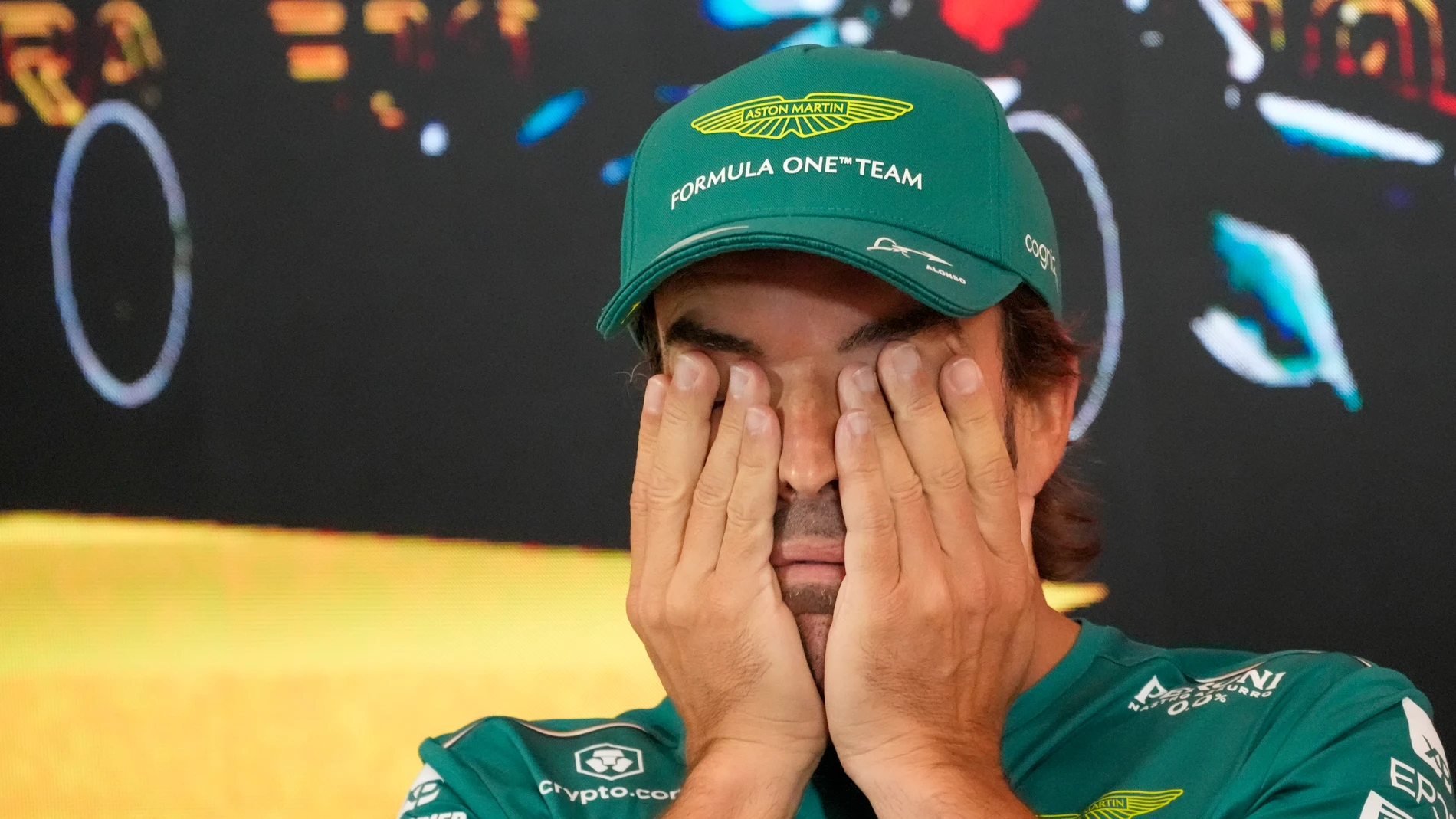 Spanish Formula One driver Fernando Alonso of Aston Martin touches his eyes during a news conference ahead of the Austrian F1 Grand Prix at the Red Bull Ring racetrack in Spielberg, Austria, Thursday, June 29, 2023. The Austrian F1 Grand Prix is held on Sunday, July 2, 2023. (AP Photo/Darko Vojinovic)