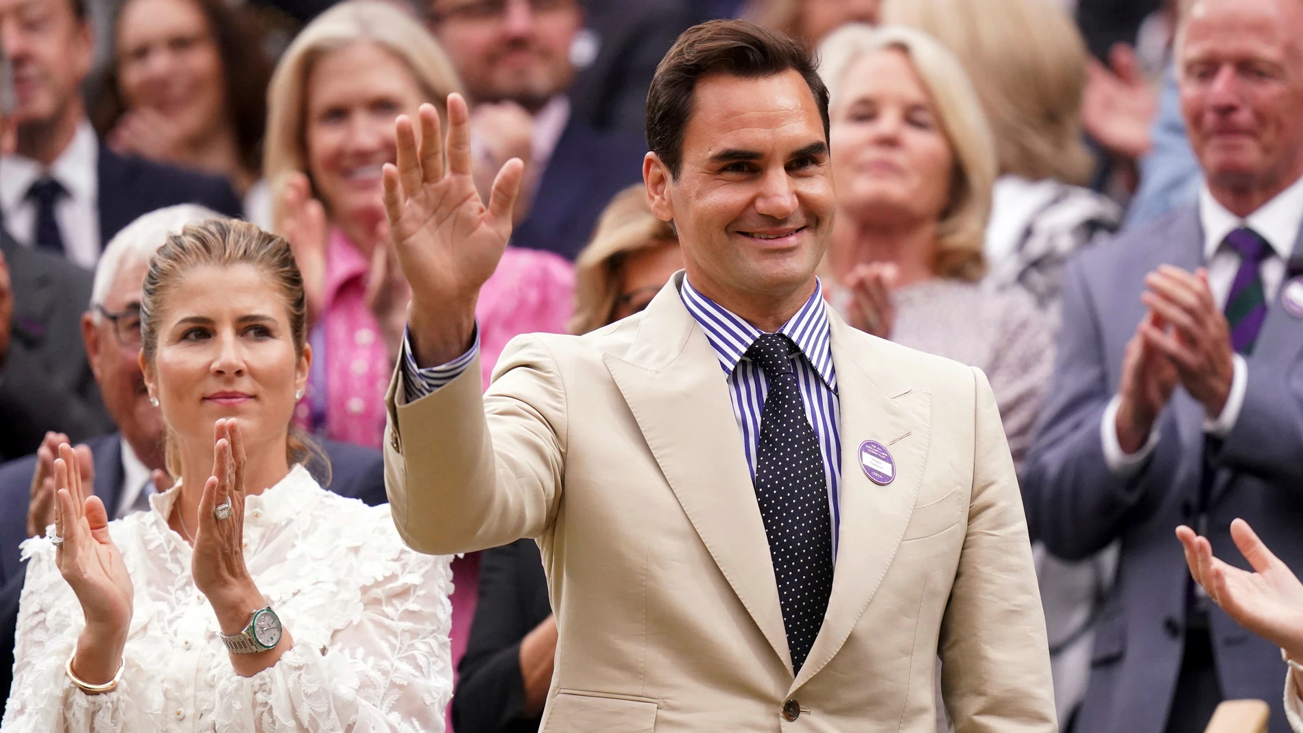 Tennis champion Roger Federer and his wife Mirka, left, stand in the royal box on day two of the Wimbledon tennis championships in London, Tuesday, July 4, 2023. (Adam Davy/PA via AP)