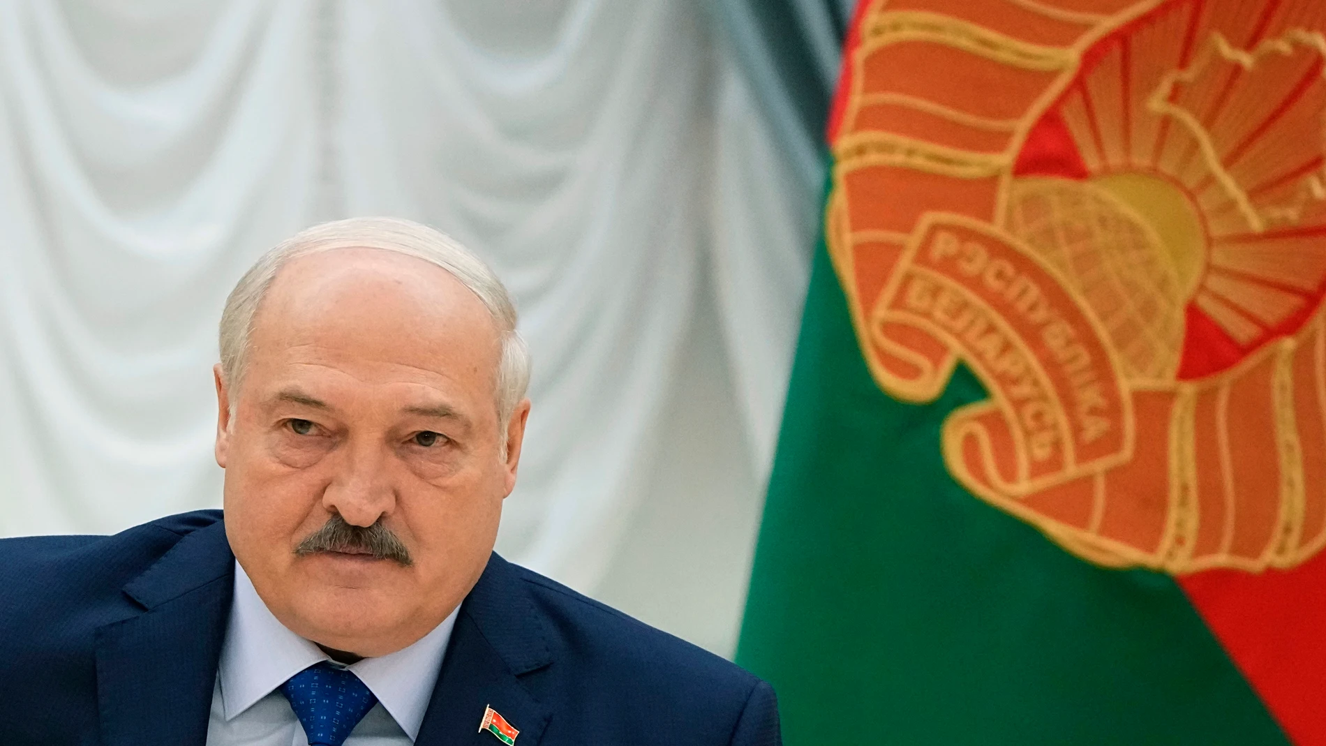 Belarusian President Alexander Lukashenko listens, during his meeting with foreign correspondents, in Minsk, Belarus, Thursday, July 6, 2023. (AP Photo/Alexander Zemlianichenko)