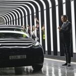 Elon Musk, Tesla CEO, right, claps hands at the opening of the Tesla factory Berlin Brandenburg in Gruenheide, Germany.