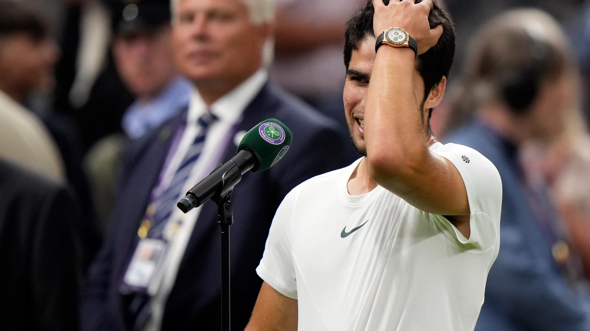 Spain's Carlos Alcaraz speaks after beating Russia's Daniil Medvedev in their men's singles semifinal match on day twelve of the Wimbledon tennis championships in London, Friday, July 14, 2023. (AP Photo/Alberto Pezzali)