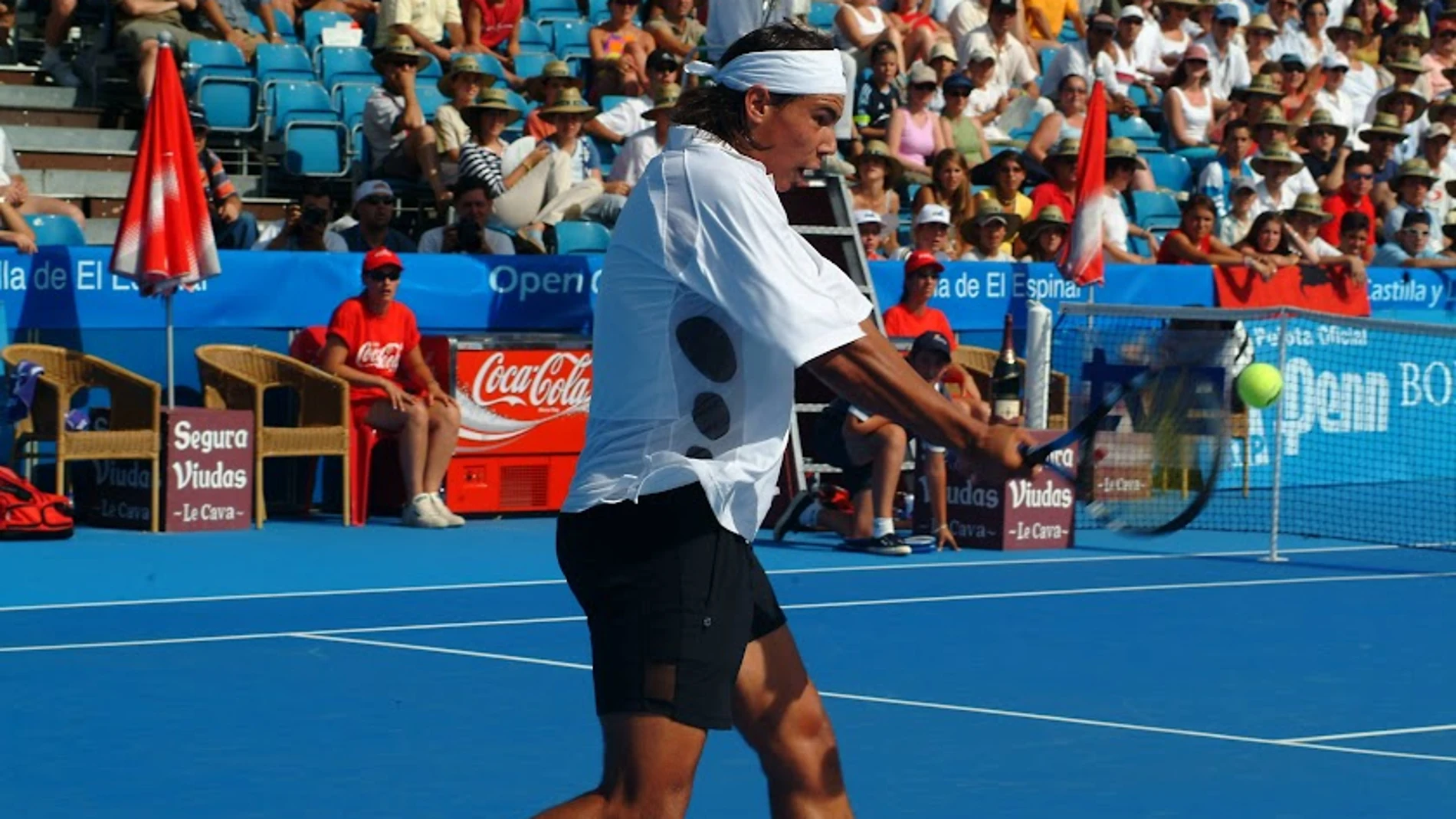 Rafa Nadal, jugando el torneo de El Espinar en 2003