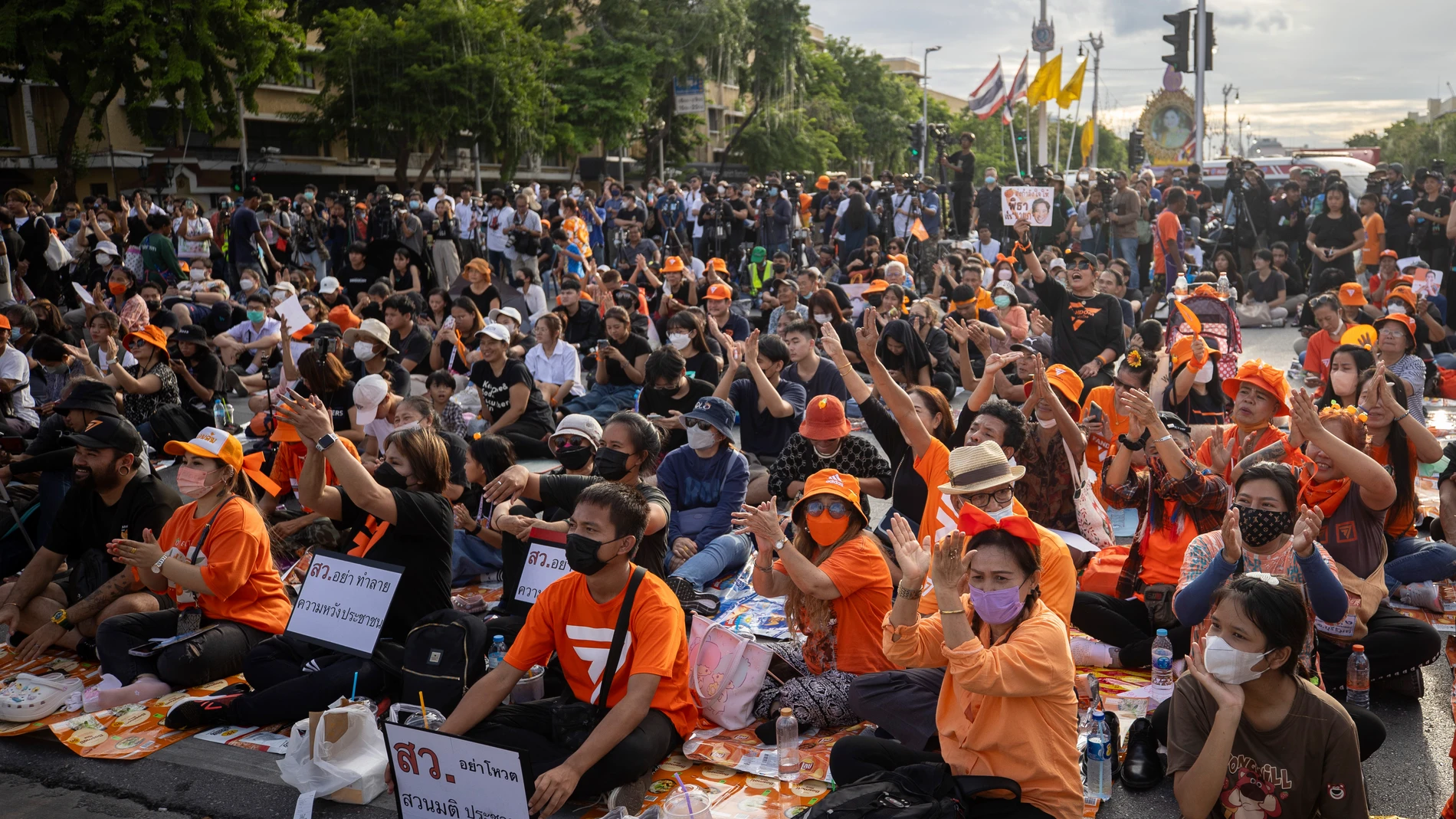 Supporters of the Move Forward Party gather at Democracy Monument during a protest in Bangkok, Thailand, Wednesday, July 19, 2023. Thailand's Constitutional Court has agreed to suspend the party's leader Pita Limjaroenrat, a candidate to become prime minister, from his duties as a member of Parliament pending its ruling on whether he violated an election law. (AP Photo/Wason Wanichakorn)