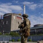 A Russian serviceman patrols the territory of the Zaporizhzhia Nuclear Power Station in Energodar