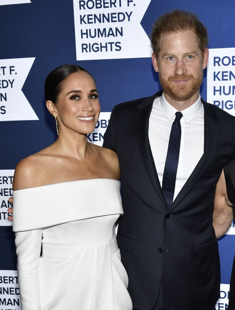 Meghan, Duchess of Sussex, left, and Prince Harry