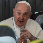 Pope Francis speaks with journalists during a press conference aboard the papal airplane heading to Rome, at the end of the 37th World Youth Day in Lisbon, Portugal, 06 August 2023. 
