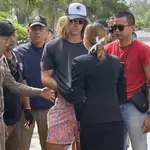 A handout photo made available by Royal Thai Police shows a Spanish chef, a murder suspect Daniel Jeronimo Sancho Bronchalo, (C) is escorted by Thai police officers during a crime reenactment at a scene in Koh Phangan island, southern Thailand,