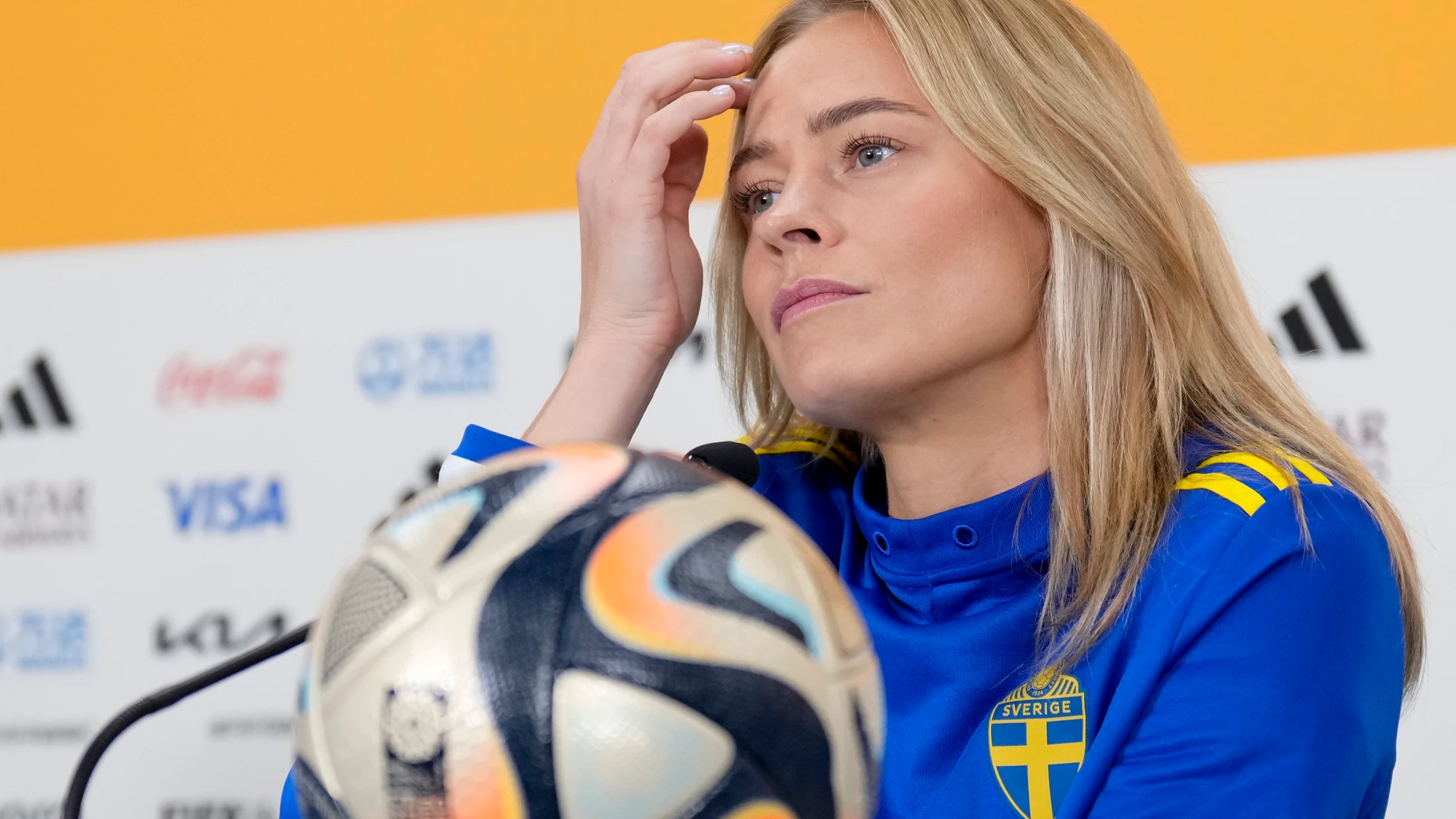 Sweden's Fridolina Rolfo listens reporters' questions during a press conference ahead of the Women's World Cup semifinal match between Spain and Sweden at Eden Park, Auckland, New Zealand, Monday, Aug.14, 2023. (AP Photo/Alessandra Tarantino)