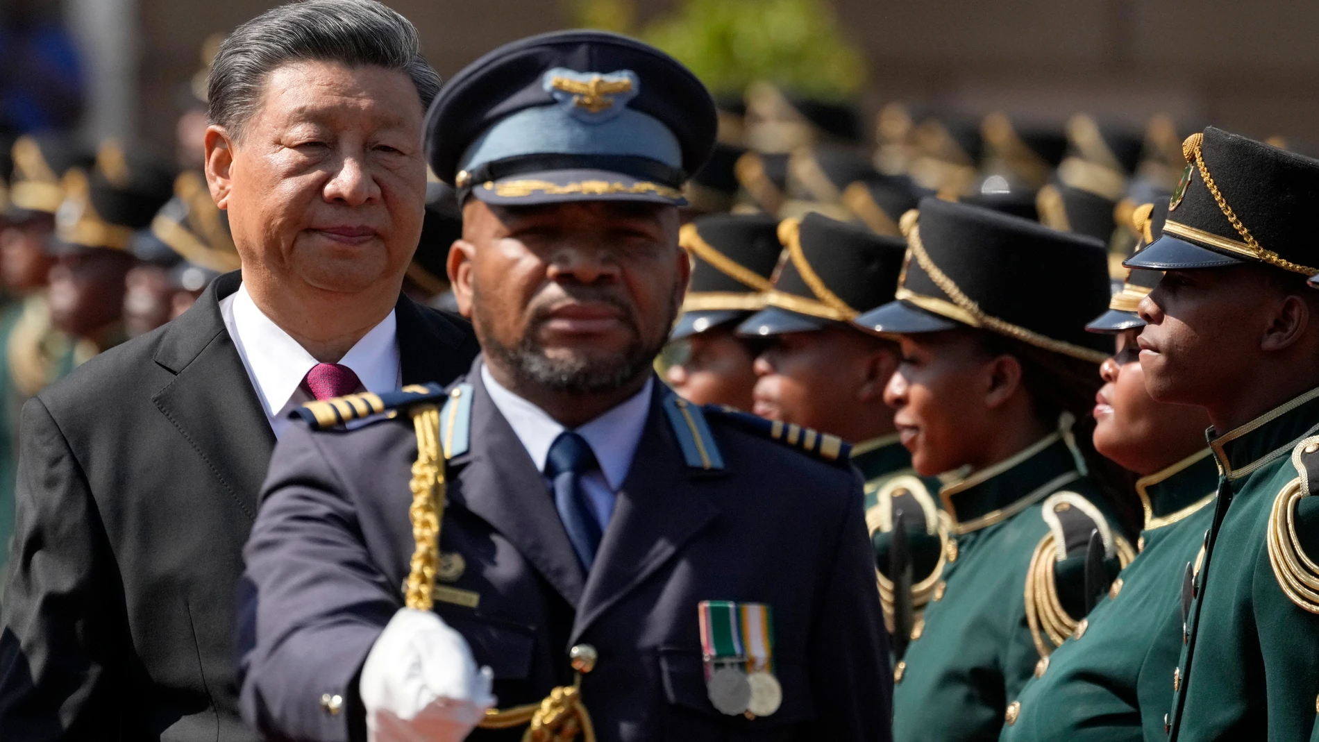 Chinese President Xi Jinping observes a guard of honour during a state visit at Union Building in Pretoria, South Africa, Tuesday, Aug. 22, 2023. Chinese President Xi Jinping has arrived for a state visit in South Africa where the two countries are expected to strengthen ties ahead of the BRICS summit starting in Johannesburg on Tuesday. (AP Photo/Themba Hadebe)