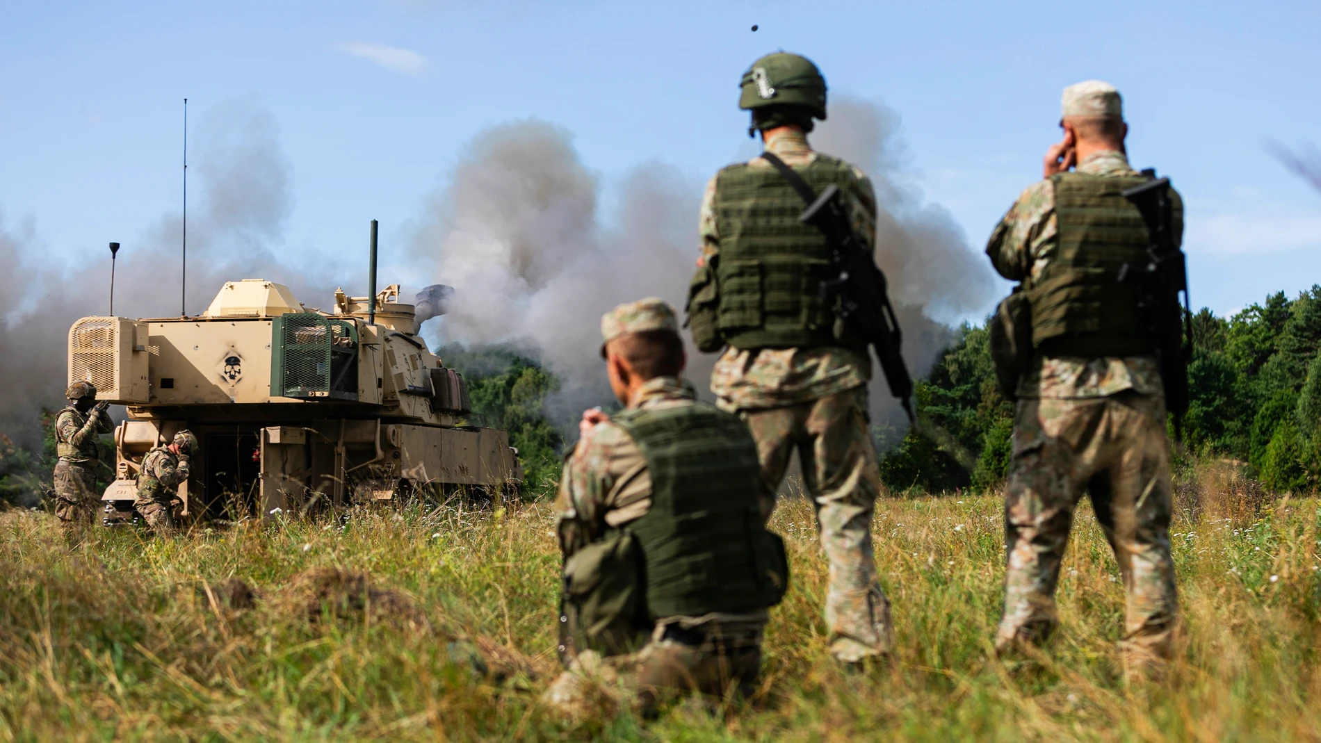 July 27, 2023 - Klaipeda, Estonia - Lithuanian Land Forces soldiers observe An M109A6 Paladin self-propelled howitzer operated by Charlie Battery, 3rd Battalion, 16th Field Artillery Regiment, supporting 4th Infantry Division, during the Baltic Thunder live-fire exercise near Klaipeda, Lithuania, July 27. The multi-national exercise provided NATO allies from Lithuania and Slovakia an opportunity to conduct fire missions, and share best practices. The 4th Inf. Div.'s mission in Europe is to en...