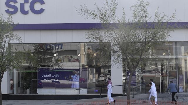 People walk outside Saudi Telecommunication Company (stc) office in Riyadh, Saudi Arabia, 06 September 2023. Saudi Telecommunication Company (STC) group announced that it had acquired a 9.9 percent interest in Telefonica S.A., one of the largest telecommunications companies in the world.