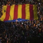 Protesters hold independence flags during a demonstration to celebrate the Catalan National Day in Barcelona, Spain, Monday, Sept. 11, 2023. The traditional September 11, called "Diada", marks the fall of the Catalan capital to Spanish forces in 1714.