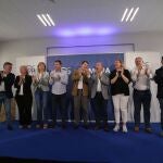 Mañueco saluda a los asistentes al acto del PP en Zamora junto a Blanco, Barrios , Faúndez y Vázquez, entre otros
