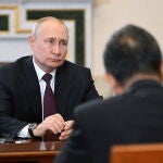 Russian President Vladimir Putin and Chinese Foreign Minister Wang Yi meet St.Petersburg