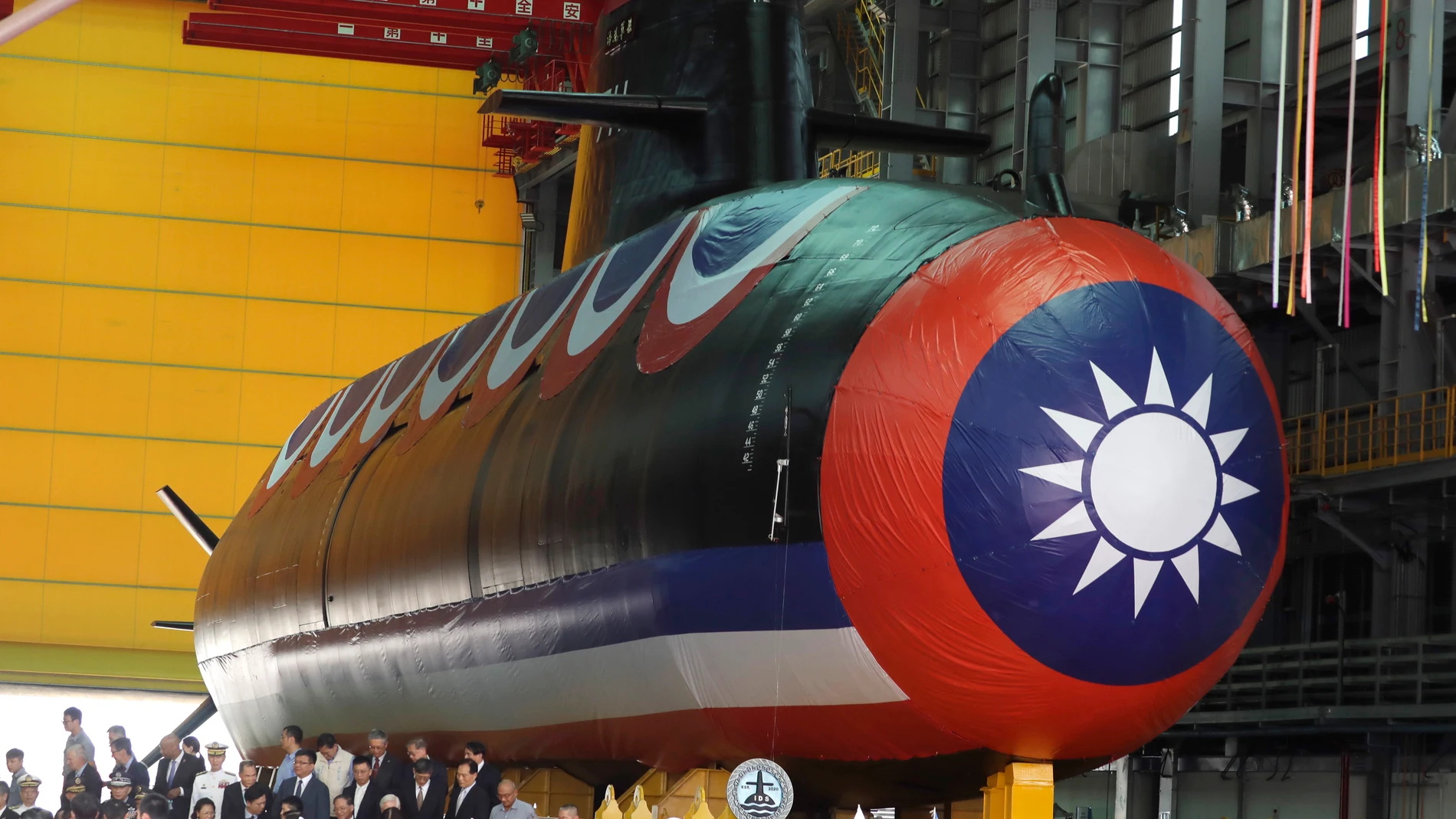 This photo shows Taiwan's domestically-made submarine during the naming and launching ceremony of domestically-made submarines at CSBC Corp's shipyards in Kaohsiung, southern Taiwan, Thursday, Sept. 28, 2023. Taiwan's first domestically made submarine prototype named ''Haikun'' (Narwhal) and starts underwater testing. (AP Photo/Chiang Ying-ying)