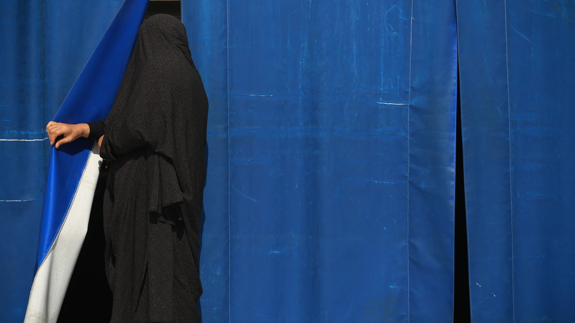 September 6, 2023, Shahr-e-Ray, Tehran, Iran: An Iranian veiled woman walks through the shrine of Shiite Saint Abdulazim, during the Arbaeen mourning ceremony, in Shahr-e-Ray, south of Tehran. Arbaeen marks the anniversary of the 40th day of mourning following the seventh-century death of the Prophet Muhammad's grandson Hussein at the hands of the Muslim Umayyad forces in the Battle of Karbala, in present-day Iraq, during the tumultuous first century of Islam's history. 06/09/2023