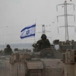 Israeli troops muster near border with Gaza Strip