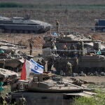 Israeli troops muster near border with Gaza Strip