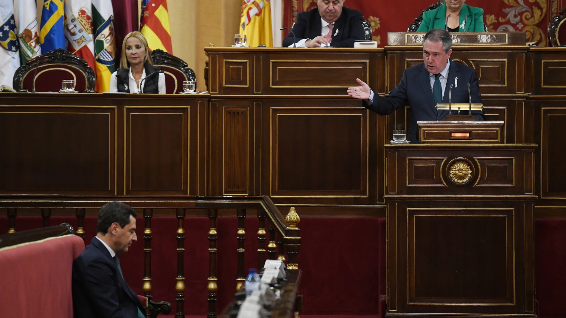 Juan Espadas, durante su intervención en el Senado, y Juanma Moreno